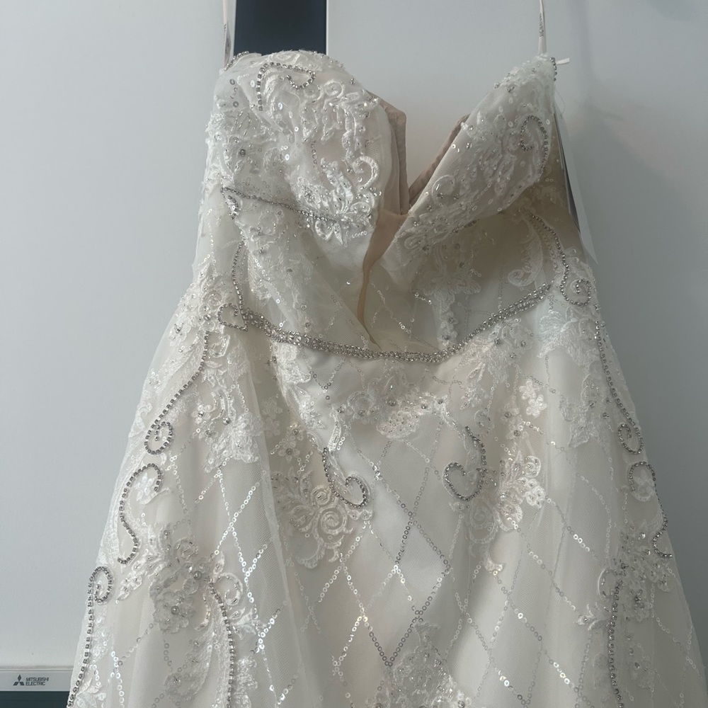 Brand name is Galina Signature size 12 perfect condition.